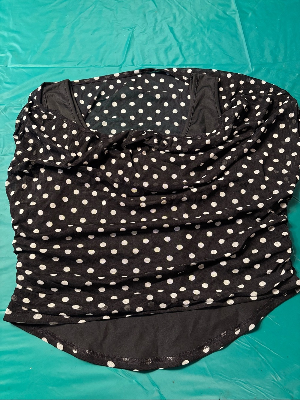 Black Polka Dot Women's Draped mid drift with black tank top under sheer dots.